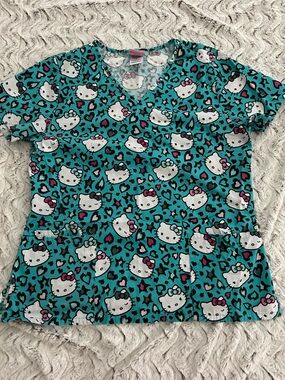 Hello Kitty Teal Short Sleeve Scrub Top with Pink Accents